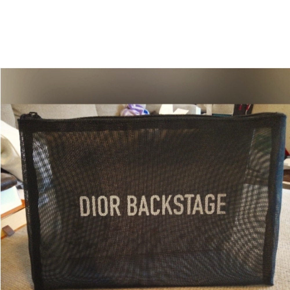 Dior Black Toiletry Bag with Mesh Design
Perfect for the beach 🏖️ 👙👙